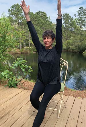 Bonnie Friedman of the Mount Pleasant Senior Center demonstrating chair yoga