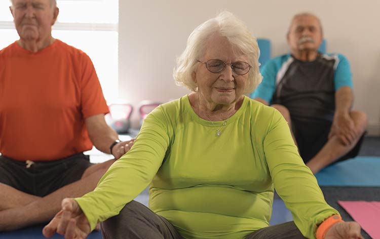 Tricia Hughey at Yoga Daily on Riviera Drive in Mount Pleasant suggests yoga as a form of exercise for seniors due to its slower pace and its effectiveness with improving joint stability, mobility and strength