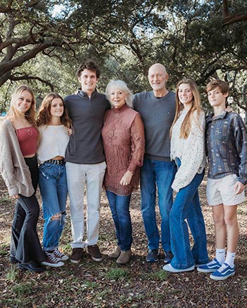 Mike and Ginny Schwartz with their grandkids.